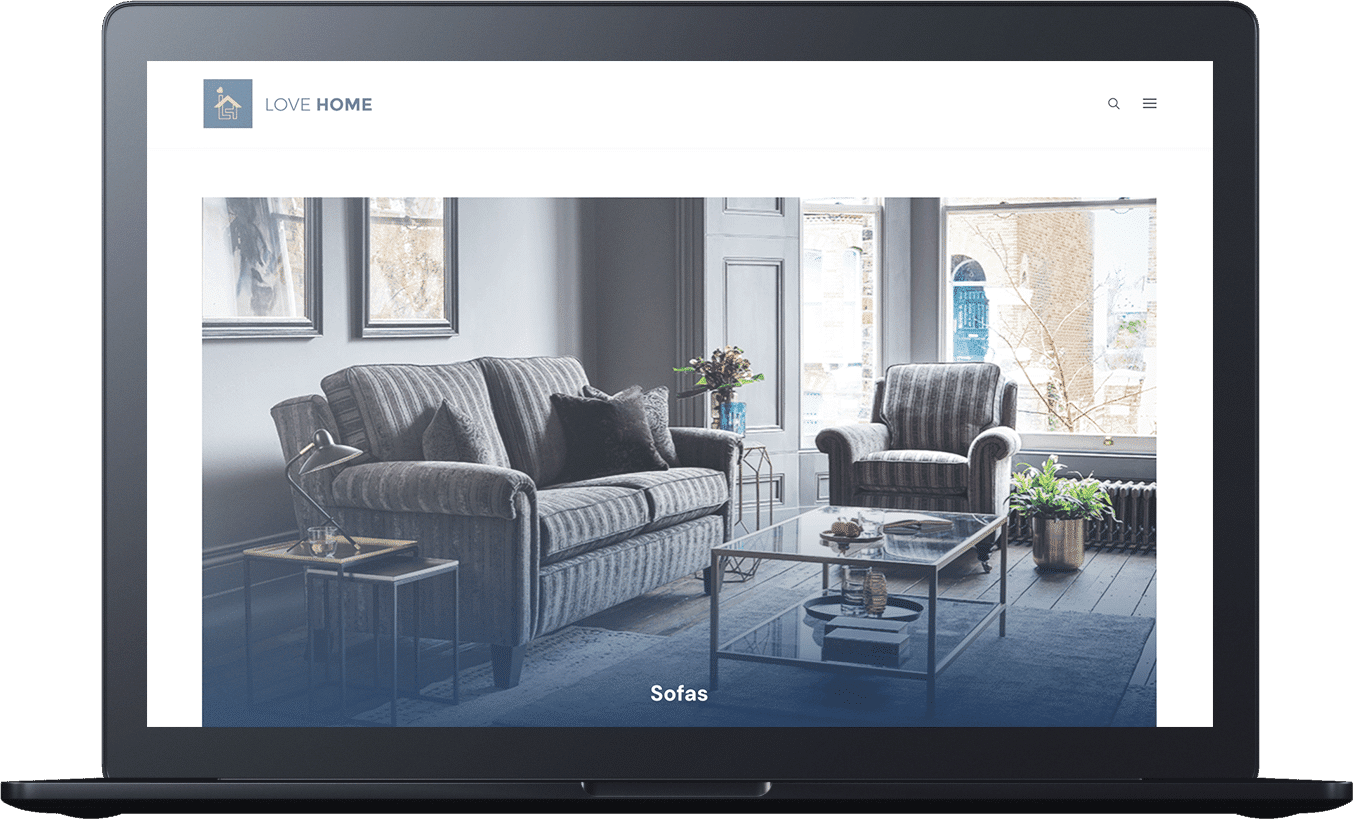 On a laptop screen, the website showcases elegant web design with a cozy living room, featuring a striped sofa, armchair, and sleek glass coffee table. This digital masterpiece exhibits the finesse of web design Essex has to offer.