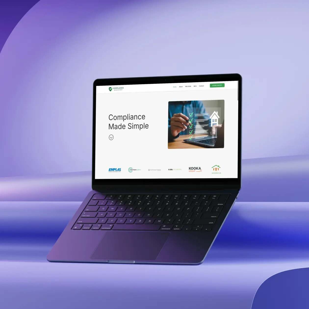 A laptop displaying a website with the headline