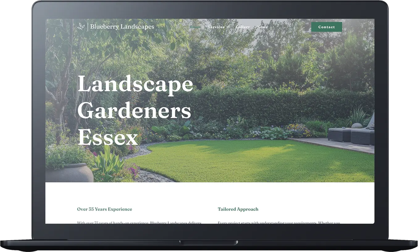 A laptop screen displays the Blueberry Landscapes website, showcasing a lush garden with vibrant green grass and prominent text reading “Landscape Gardeners Essex”.